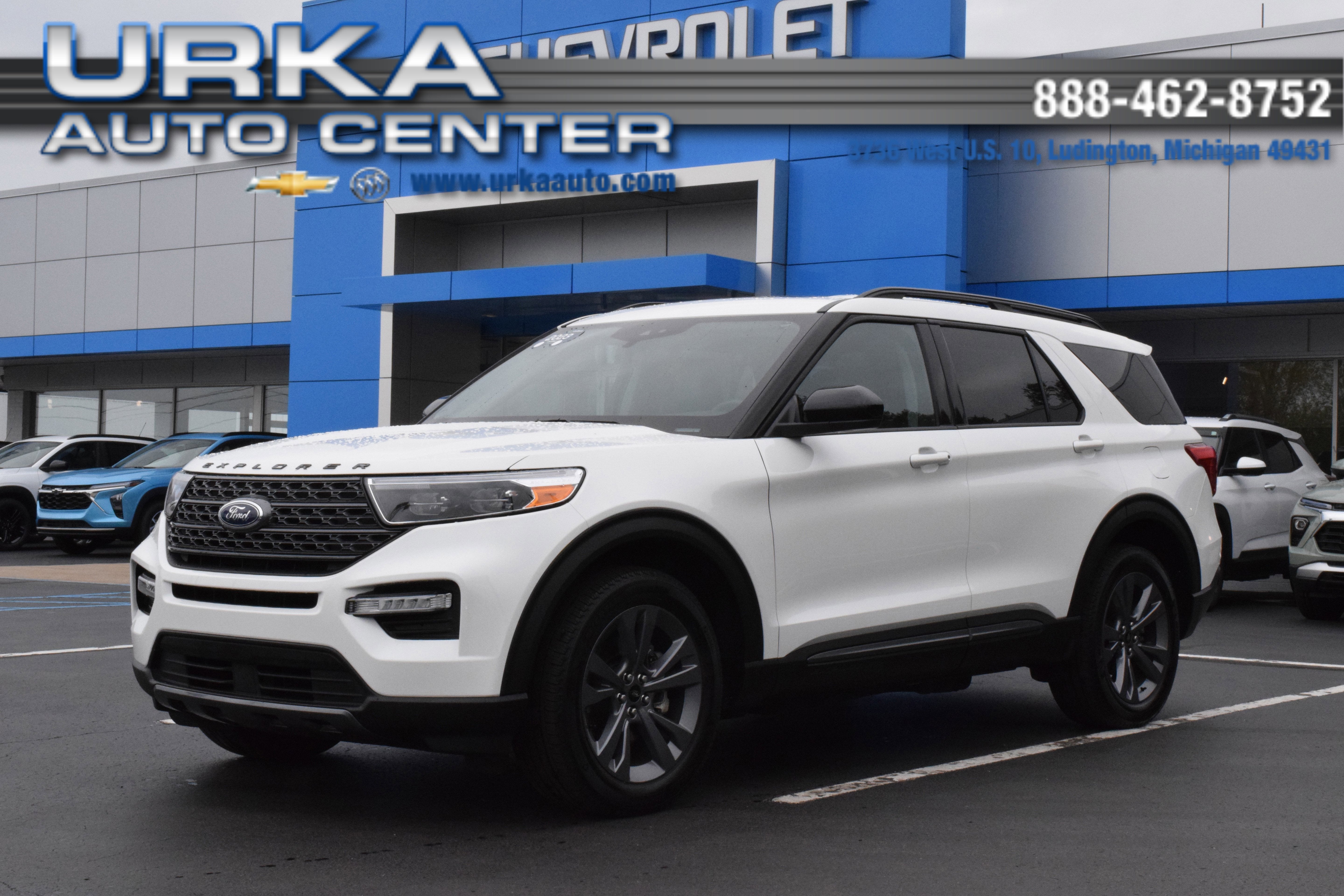 2023 Ford Explorer XLT in White — front three-quarter view