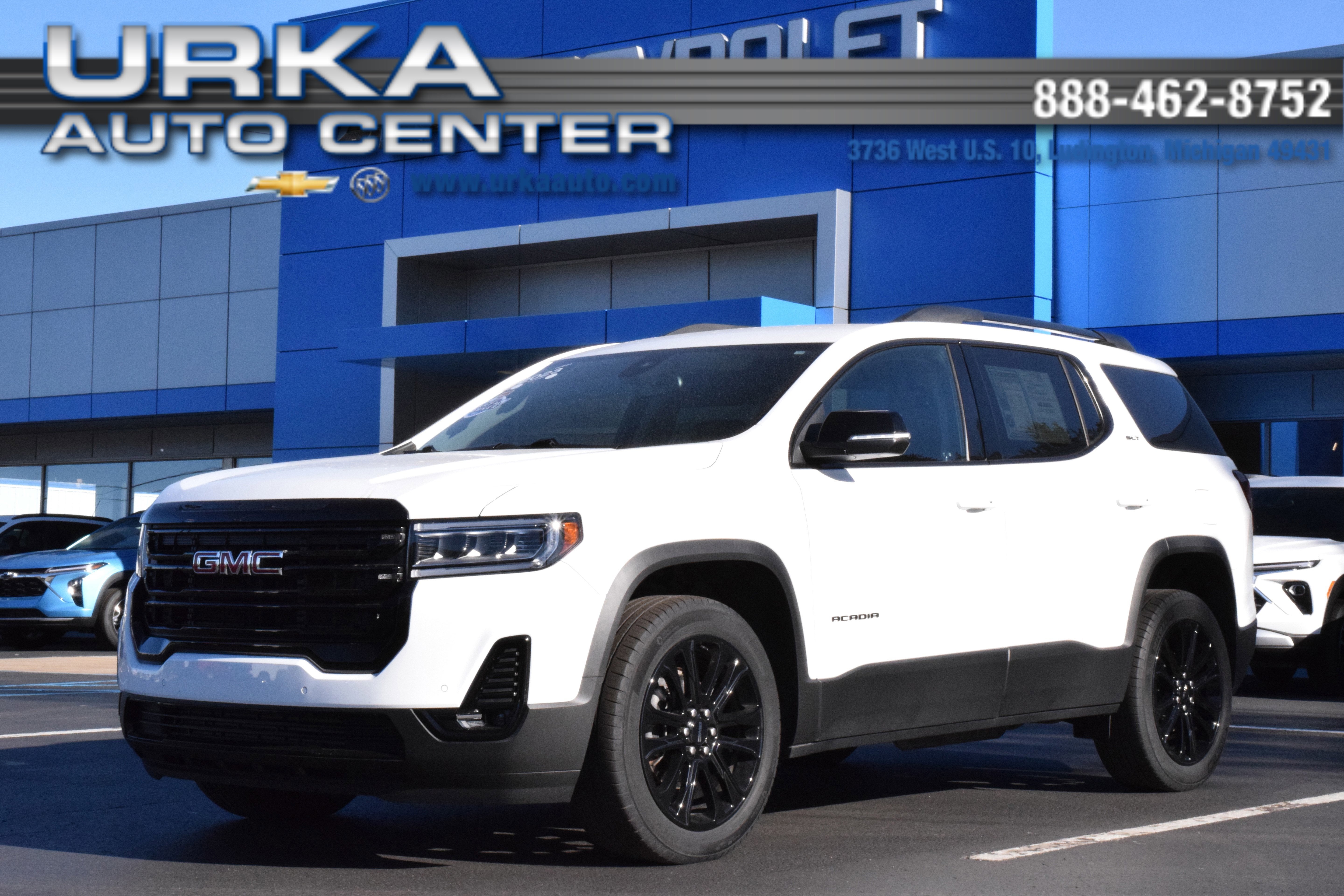 2023 GMC Acadia SLT in Summit White — front three-quarter view