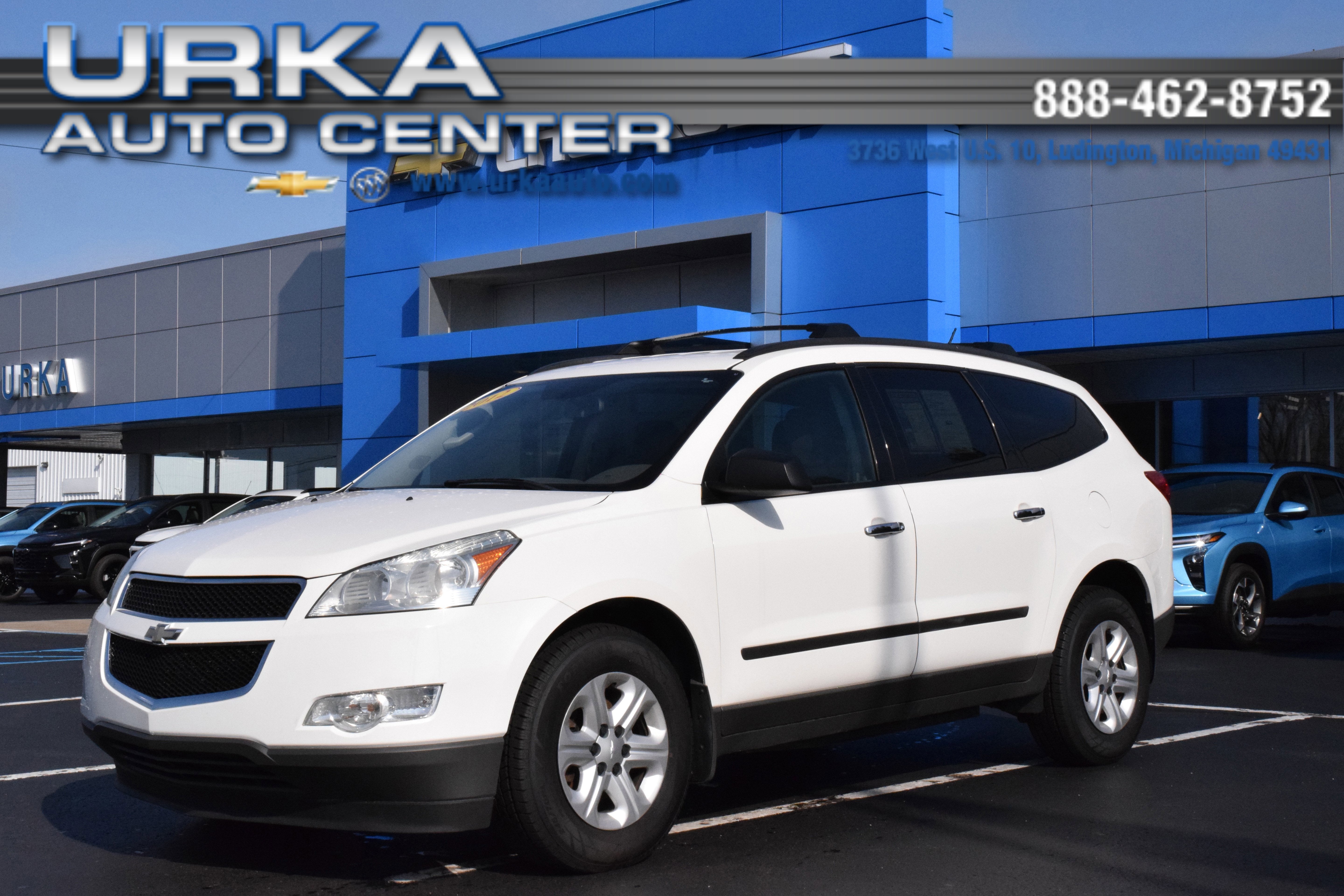 2012 Chevrolet Traverse LS in White — front three-quarter view