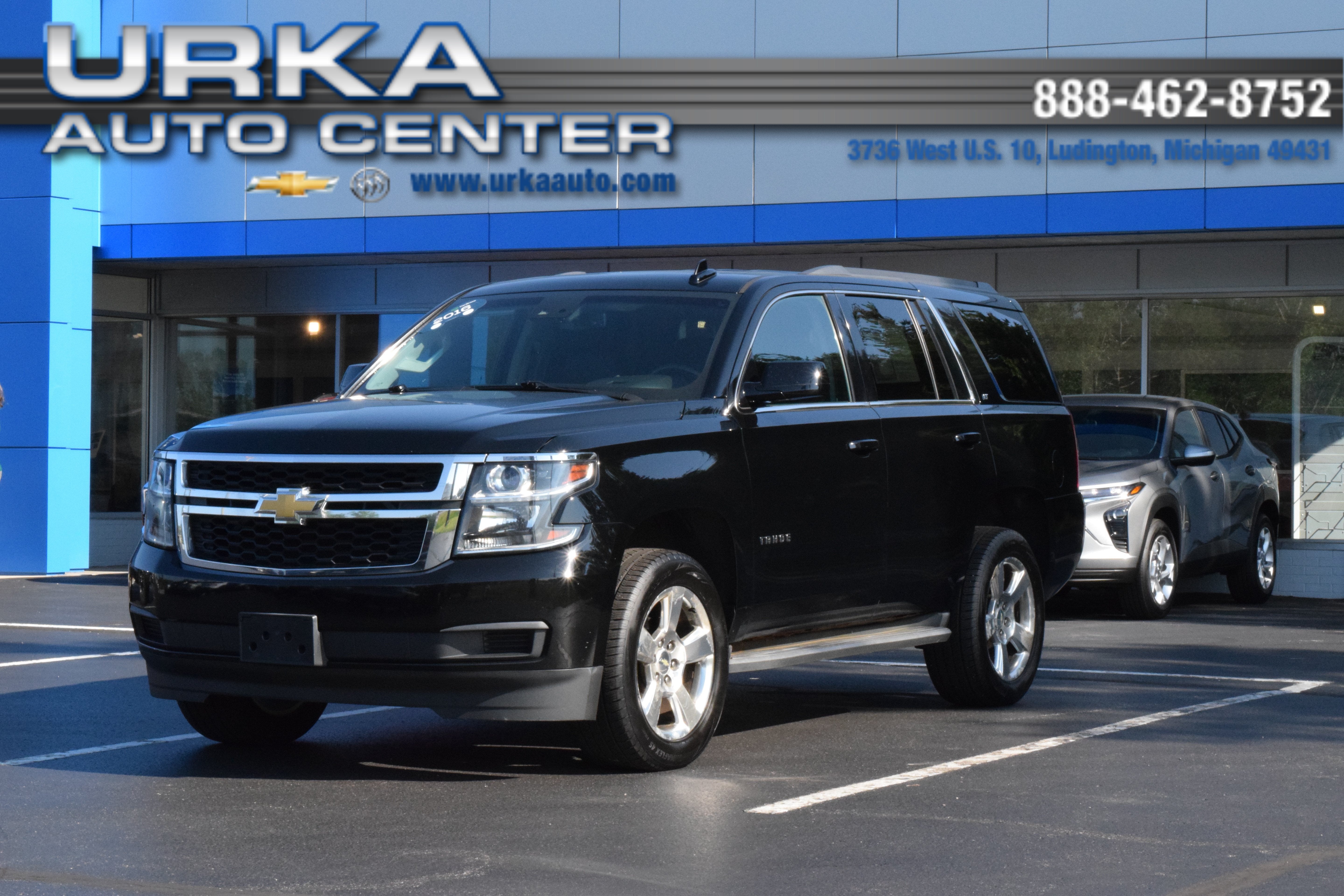 2016 Chevrolet Tahoe LT in Black — front three-quarter view