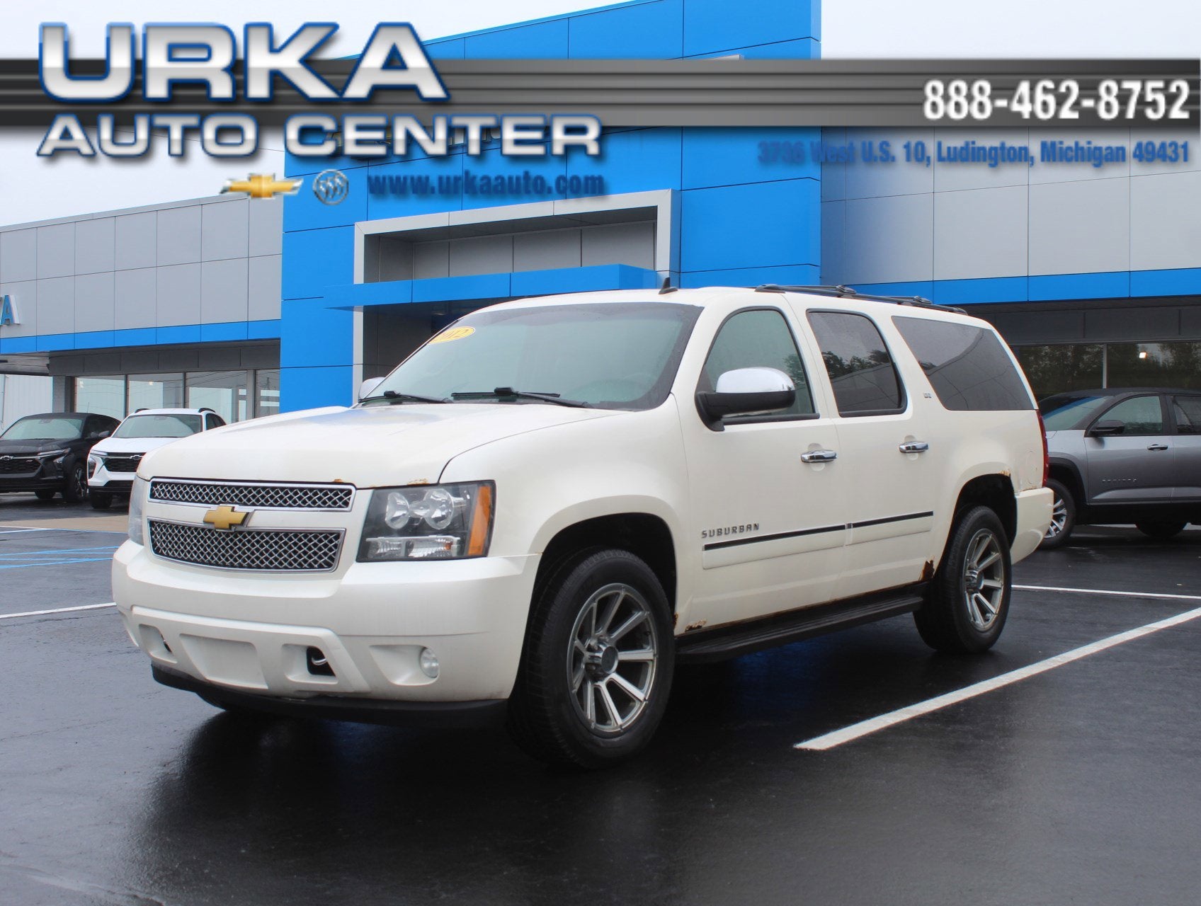 2012 Chevrolet Suburban LTZ in White Diamond Tricoat — front three-quarter view